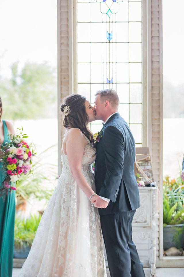 Simon wedding at Gruene Estate in New Braunfels kiss at the ceremony