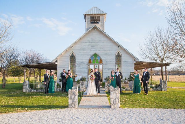 Simon wedding at Gruene Estate in New Braunfels bridal party in front of the chape