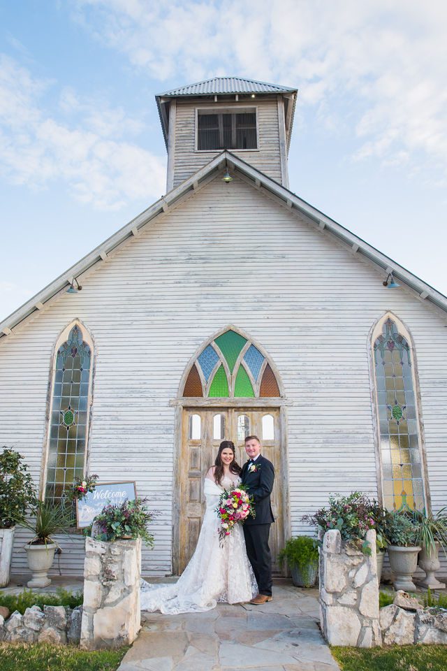 Simon wedding at Gruene Estate in New Braunfels couple in front of the chapel portrait