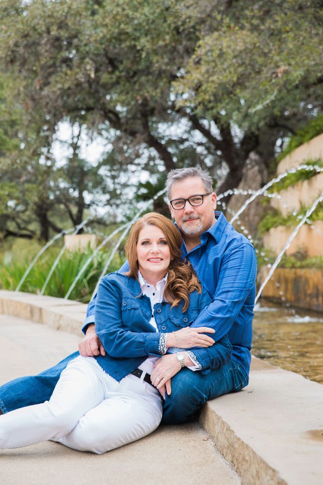Deborah's engagement at San Antonio Botanical Gardens sitting at the fountain