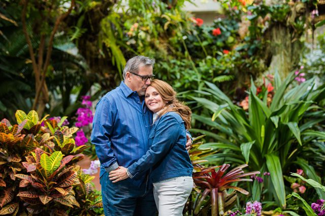Deborah's engagement at Botanical Gardens in the greenhouse hugging