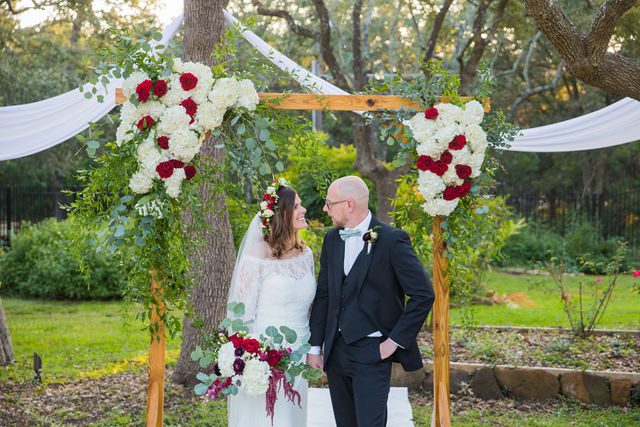 Pixley wedding in Garden Ridge couple under arch