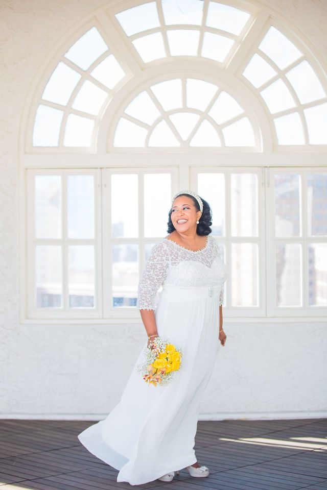 Sybil's wedding at St. Anthony Hotel on the rooftop bride portrait