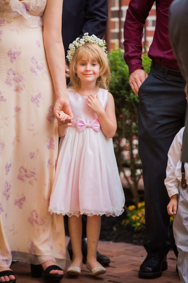 Sharon wedding in New Braunfels at McAdoos ceremony flower girl moment
