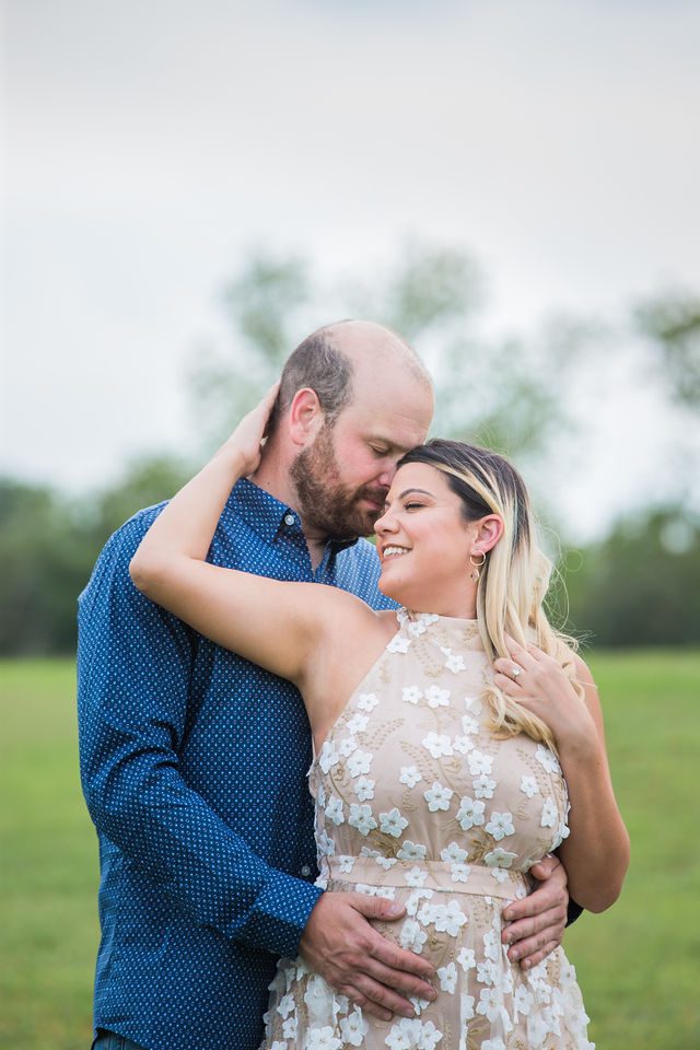 Brittany's engagement at Cypress Bend New Braunfels snuggle portrait