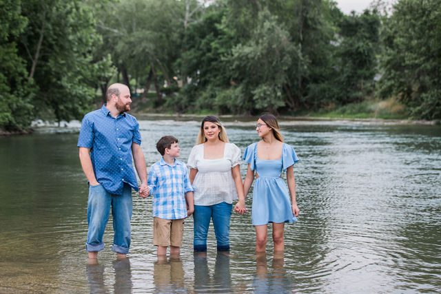 Brittany's engagement family portrait at Cypress Bend park in the river
