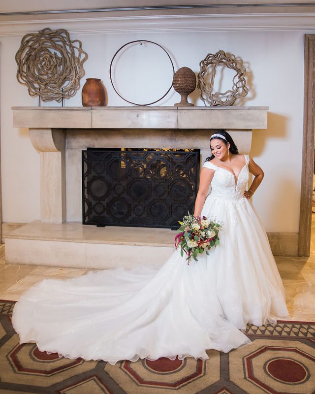 Ebonee's bridal at La Cantera looking down portrait in front of the fireplace