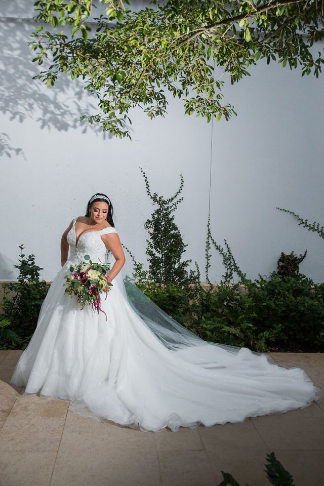 Ebonee's bridal at La Cantera portrait on the white wall looking down