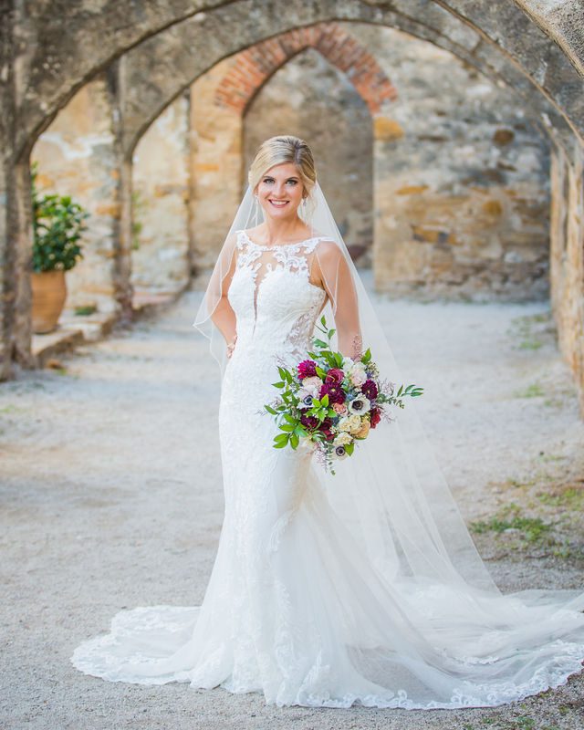 Jennifer bridal in the arches at Mission San Jose
