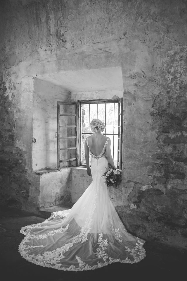 Jennifer's bridal granary window at Mission San Jose black and white