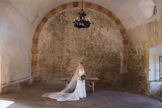 Jennifer's bridal in the granary at Mission San Jose looking back