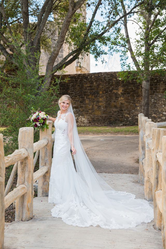 Jennifer's bridal on the bridge at Mission San Jose portrait back of dress