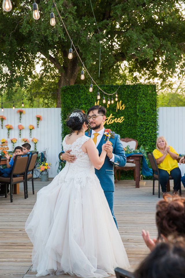 The Cruz-Martinez wedding in San Antonio reception first dance with lights