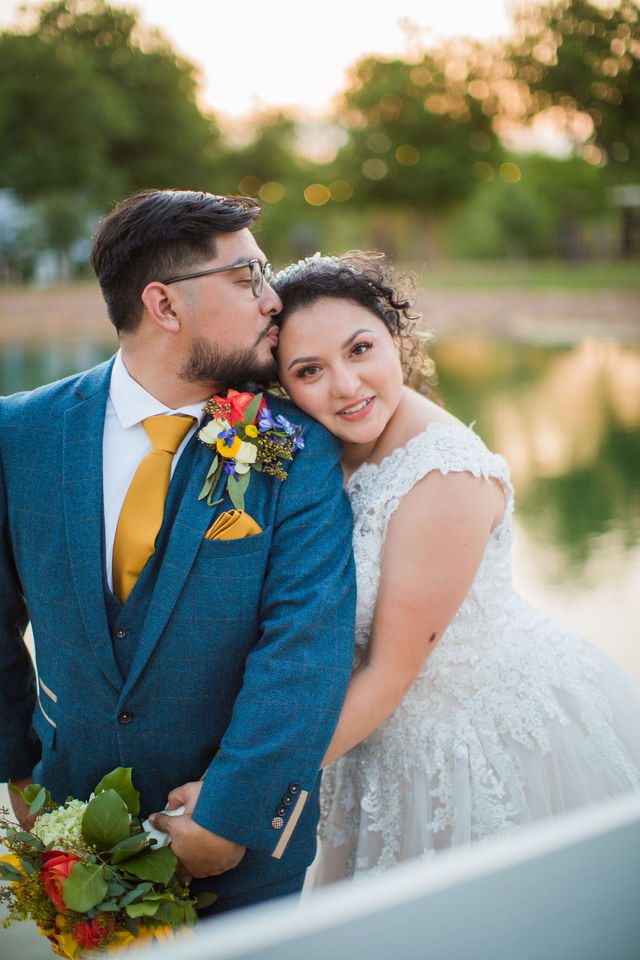 The Cruz-Martinez wedding reception in San Antonio sunset hug by the lake