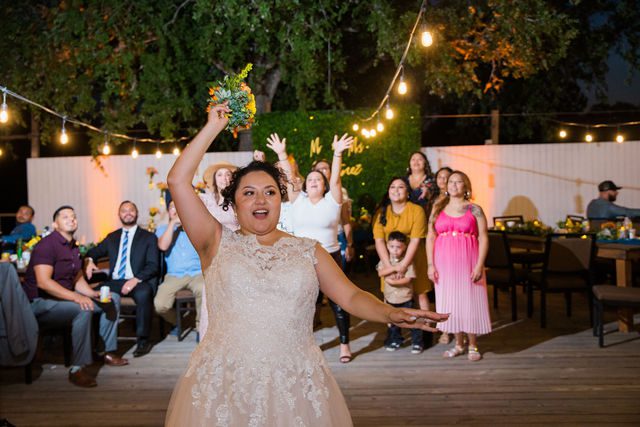 The Cruz-Martinez wedding reception in San Antonio bouquet toss