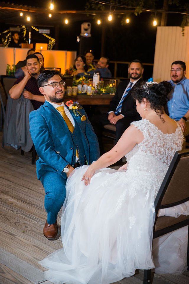 The Cruz-Martinez wedding reception in San Antonio garter