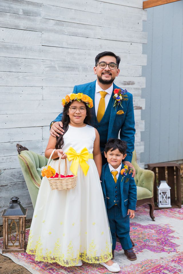The Cruz-Martinez wedding in San Antonio the groom and kids portrait
