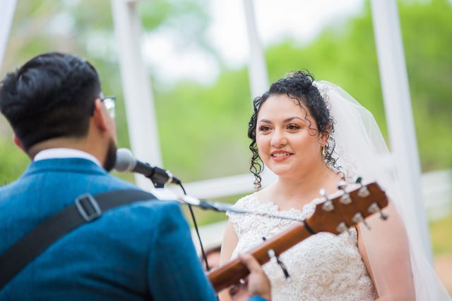 The Cruz-Martinez wedding in San Antonio groom plays the ceremony