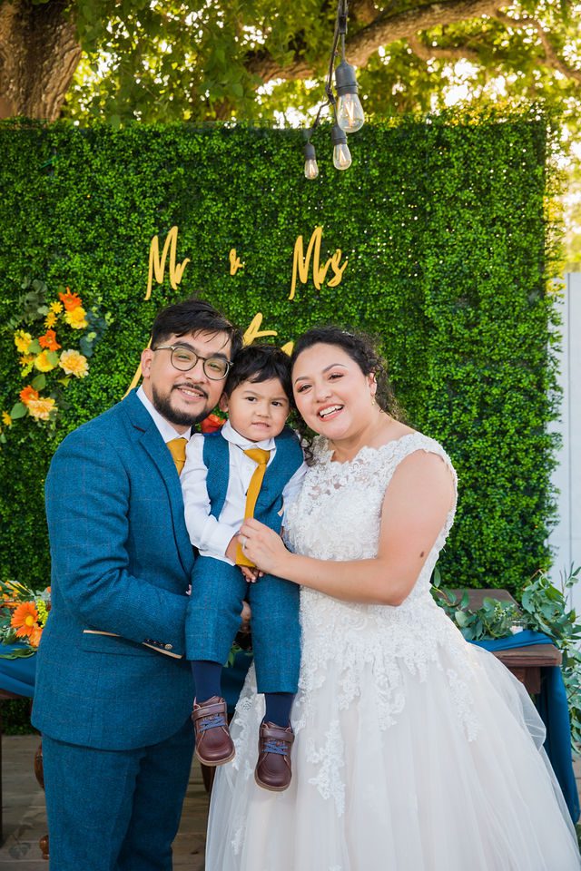 The Cruz-Martinez wedding in San Antonio portrait with the kid