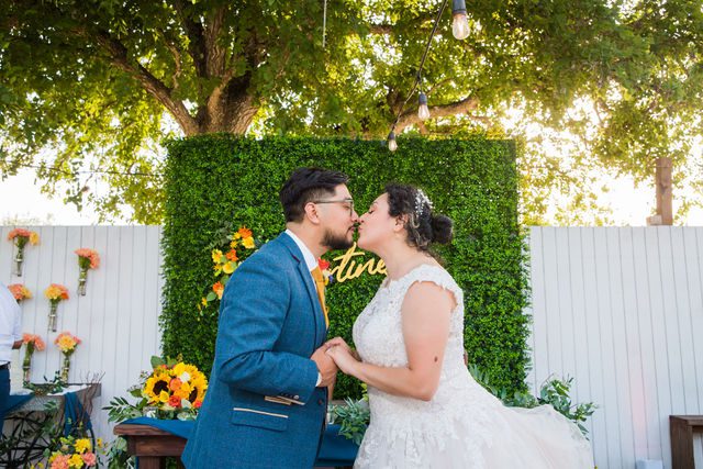 The Cruz-Martinez wedding in San Antonio couple kiss portrait