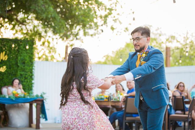 The Cruz-Martinez wedding in San Antonio reception daughter and groom dance