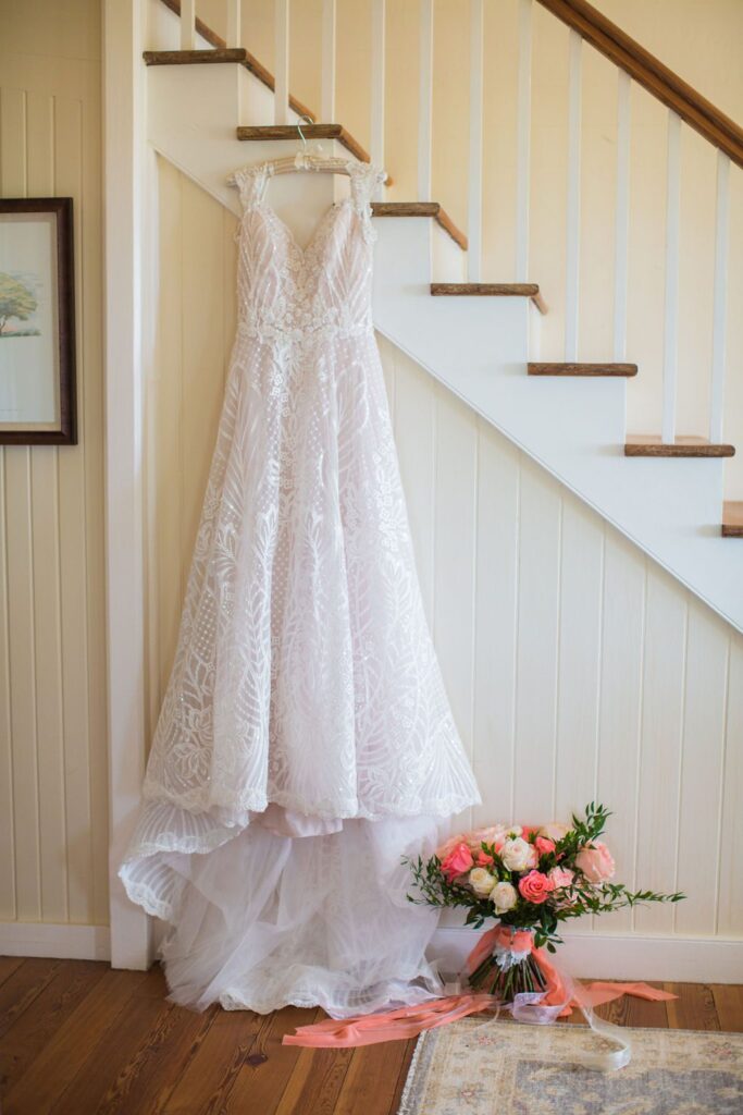 The Hamet wedding in San Antonio. The bride's dress hanging on the stairs.
