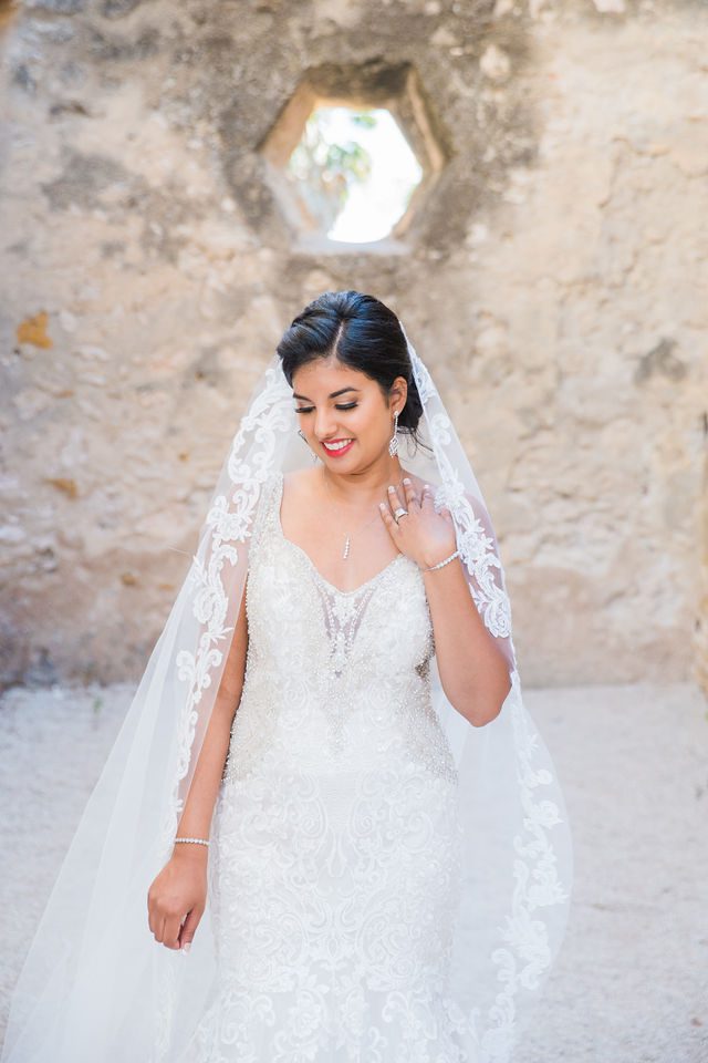 Sonali's bridal in the octagon room at Mission San Jose veil looking down