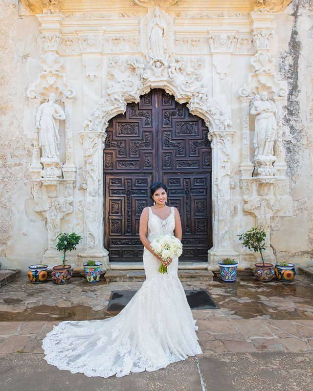 Sonali's bridal portrait at the church doors at Mission San Jose