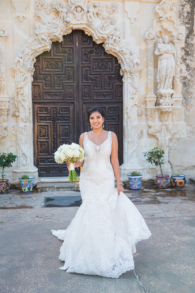 Sonali's bridal portrait in front of the doors at Mission San Jose
