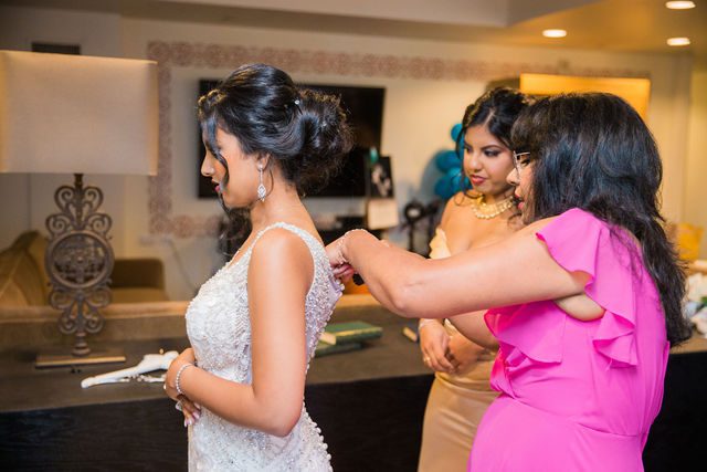 Sonali's wedding in San Antonio at Hotel Valencia bride dressing