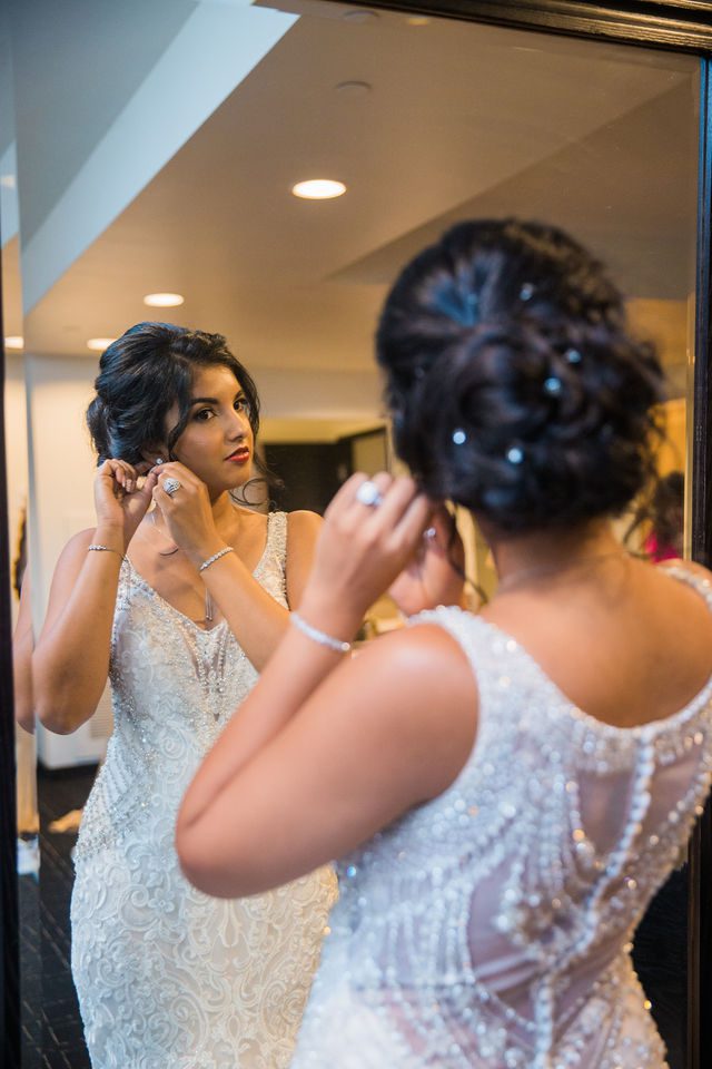 Sonali's wedding in San Antonio at Hotel Valencia bride and earrings