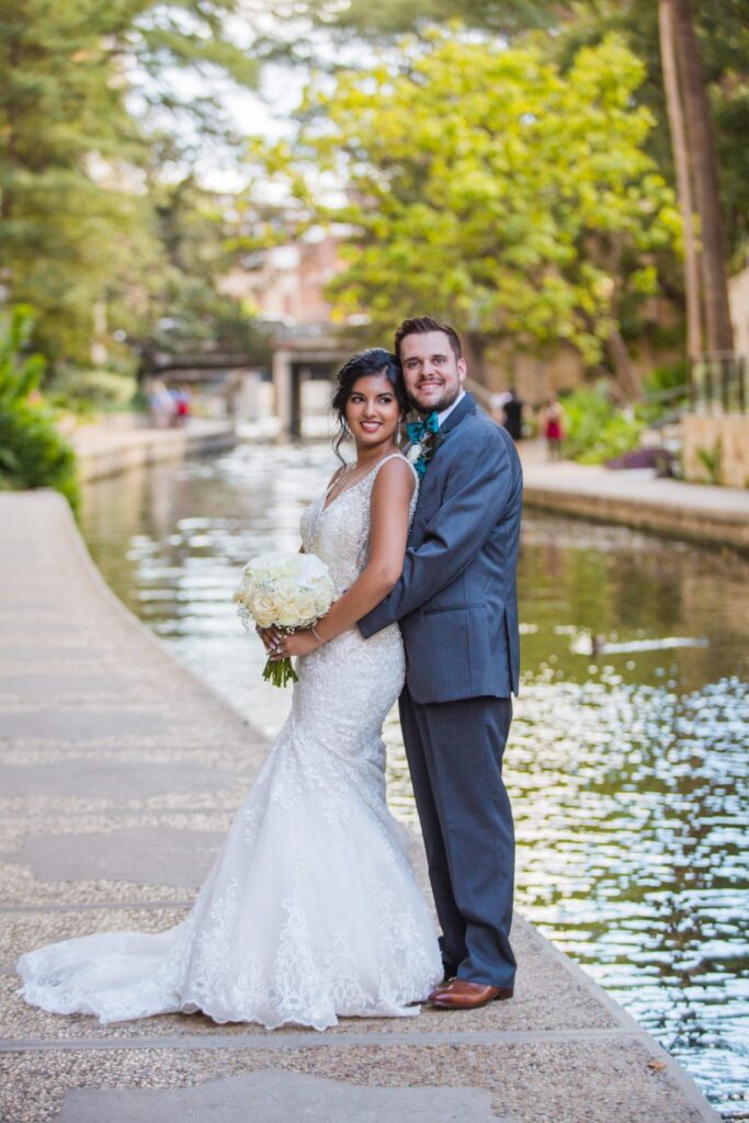Sonali's wedding in San Antonio at Hotel Valencia bride and groom on the river
