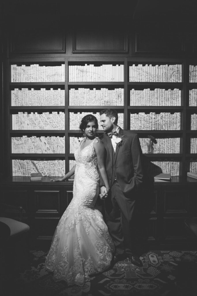 Sonali's wedding at Hotel Valencia couple in the library