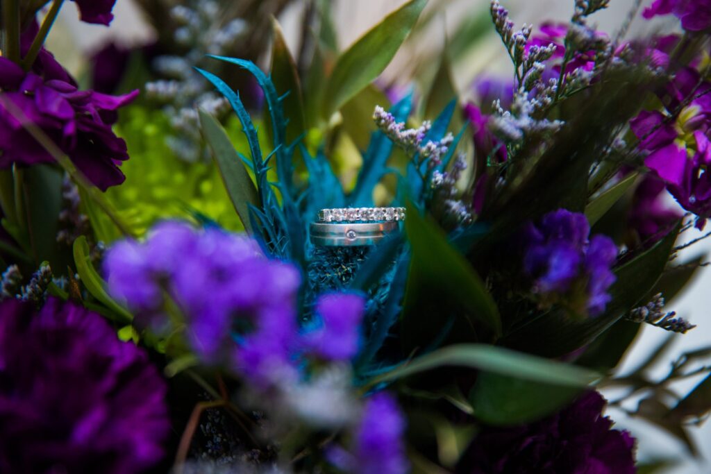 Sonali's wedding rings in the flowers at Hotel Valencia