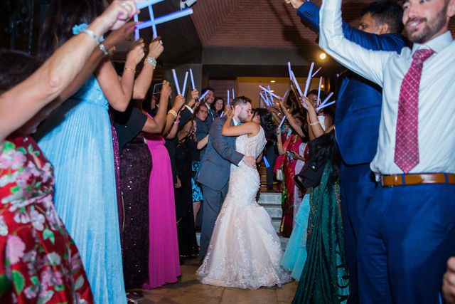 Sonali's wedding at Hotel Valencia reception LED exit kiss