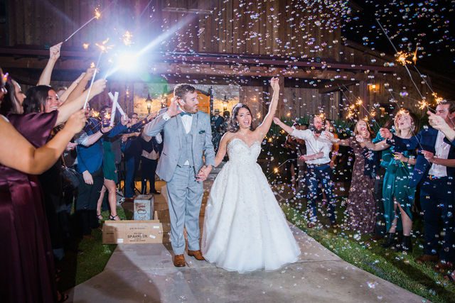 Weyand wedding reception at the Chandelier of Gruene bubble and sparkler exit