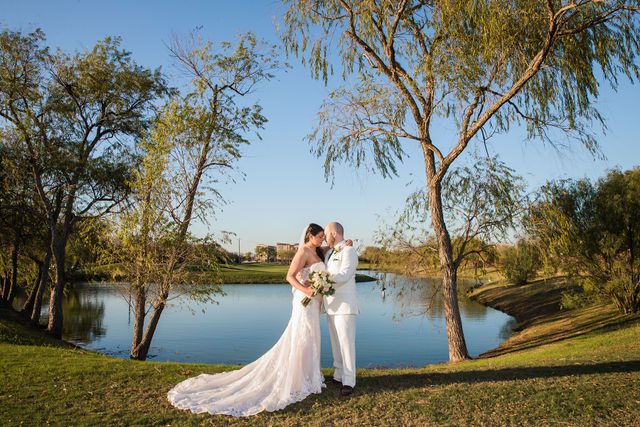 Tate wedding at Olympia Hills couple portrait on the pond