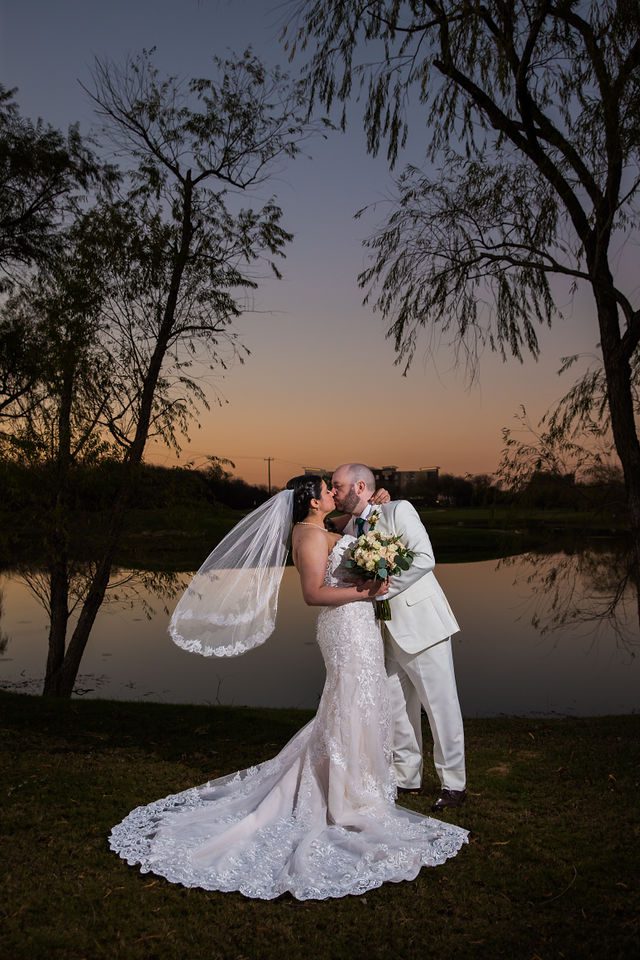 Tate wedding at Olympia Hills couple dip at sunset