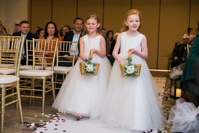 Olsen wedding Boerne at the Kendall the flower girls walking down the aisle