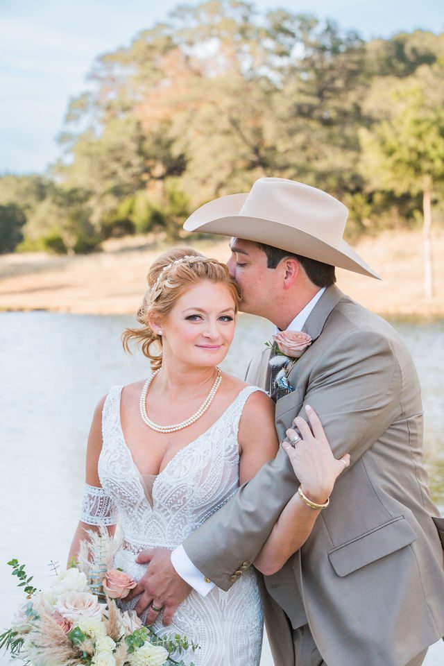 Lamm wedding at Eagle Dancer Ranch couple at the pond