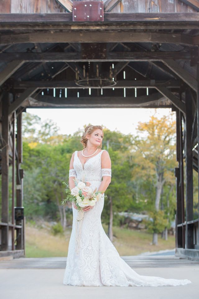 Lamm wedding at Eagle Dancer Ranch bride at the bridge
