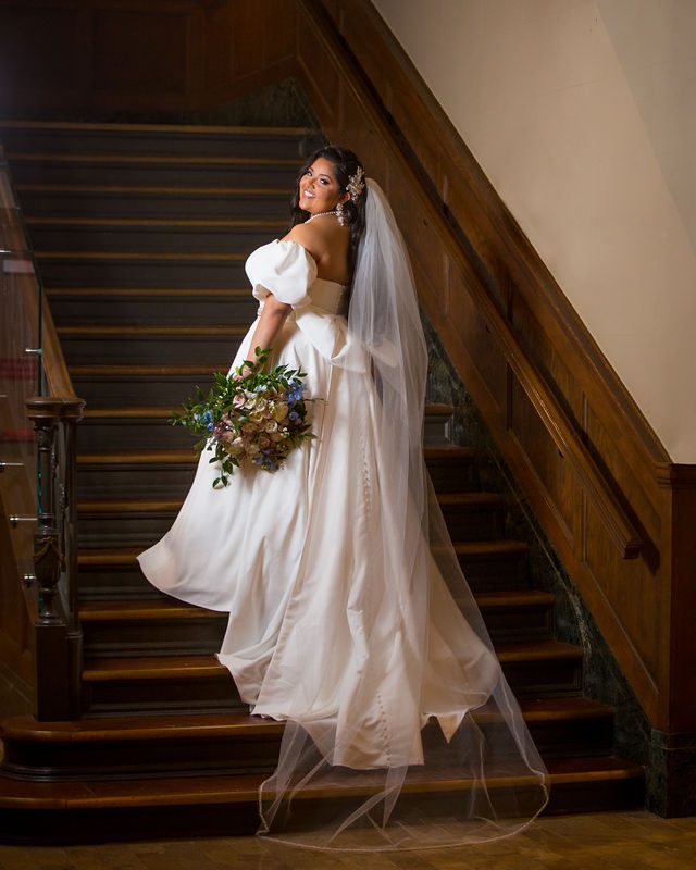 Maddie's bridal at The Briscoe in San Antonio on the stairs