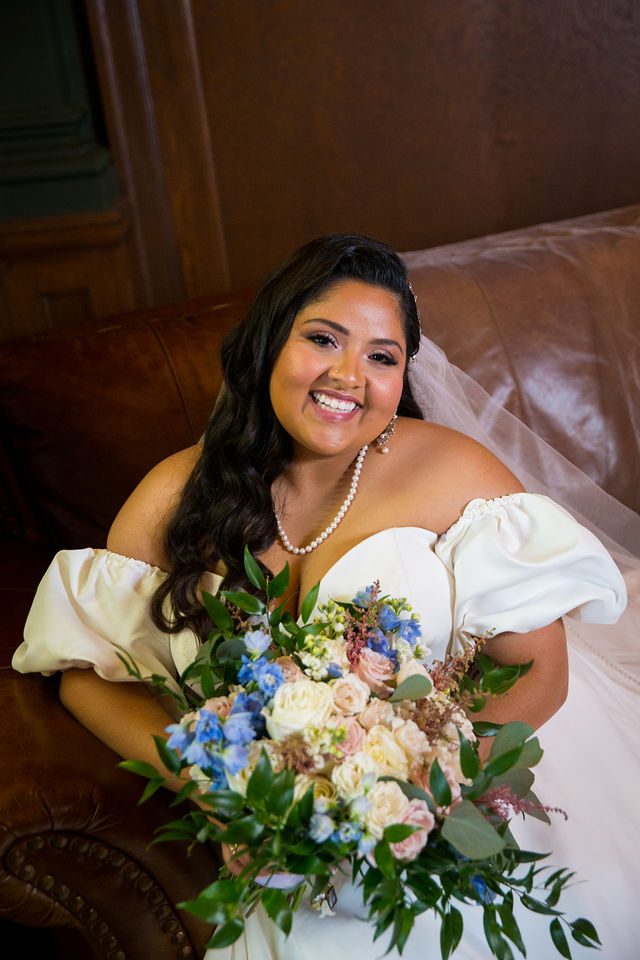 Maddie's bridal at The Briscoe in San Antonio on the sofa headshot