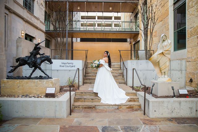 Maddie's bridal at The Briscoe in San Antonio on the gallery steps turned