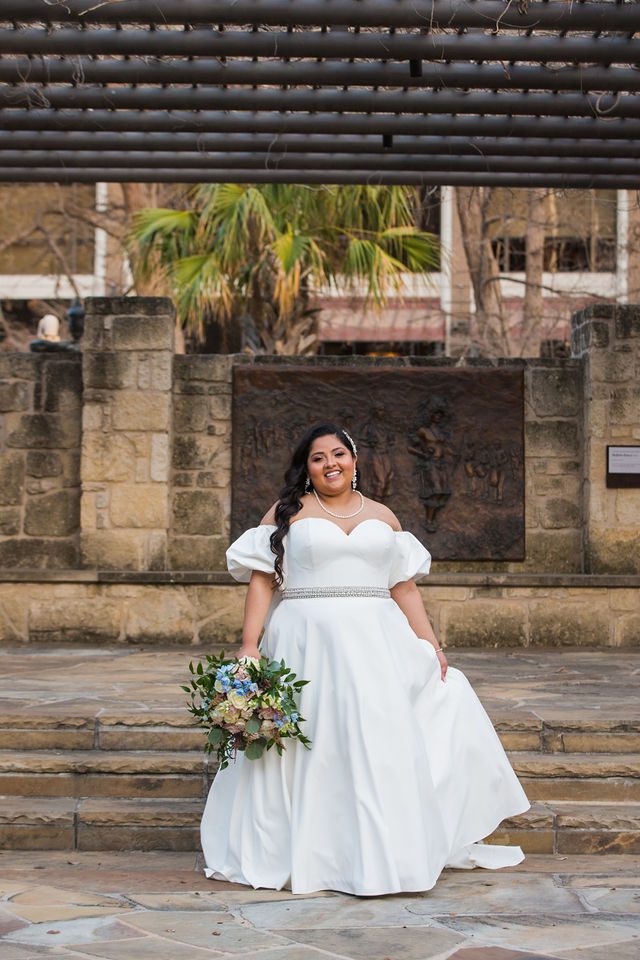 Maddie's bridal at The Briscoe in San Antonio walking off the gazebo