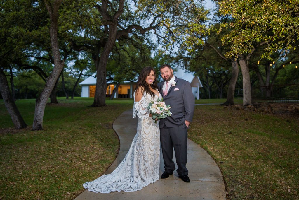 Missie's wedding at the Chandelier of Gruene couple portrait on the path