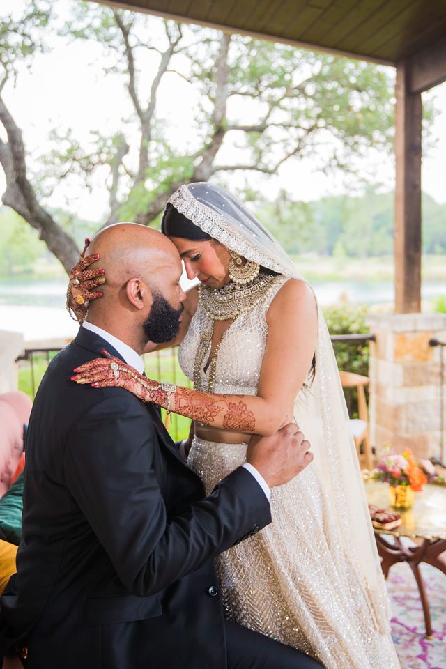 Nida wedding Club of Garden Ridge in San Antonio groom and bride touching head