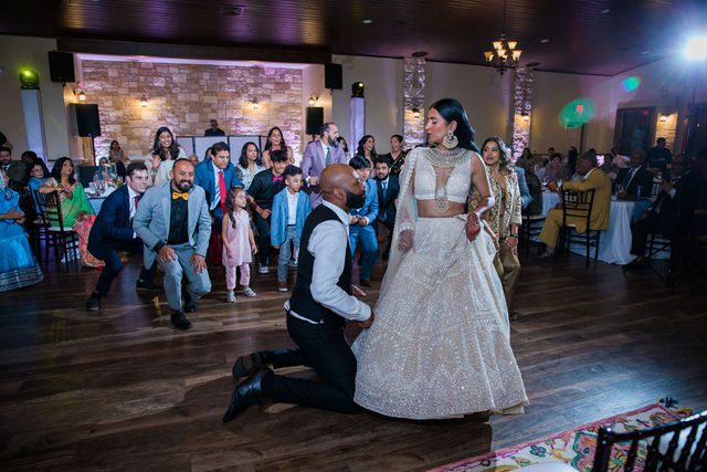 Nida wedding reception Club of Garden Ridge in San Antonio family dance with couple