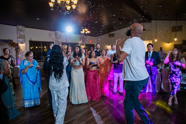 Nida wedding reception Club of Garden Ridge in San Antonio bubble party