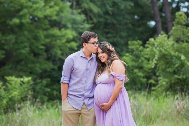 Yoli maternity session at Cibolo Natural Area in the grass with Troy